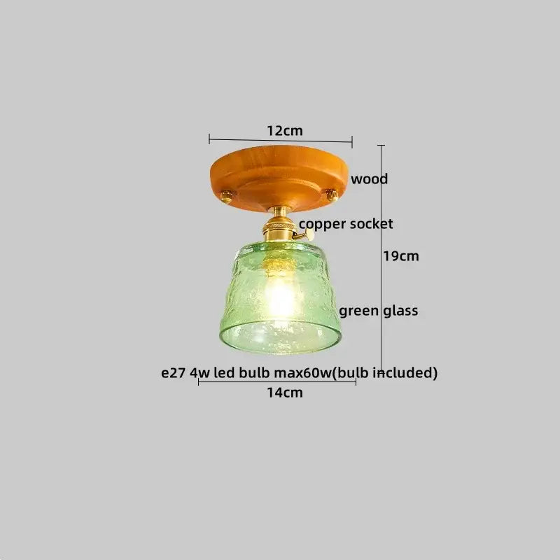 Vintage-style amber leaf brass glass ceiling lamp with warm wood base and textured green glass shade for bedroom decorbites brass glass lighting