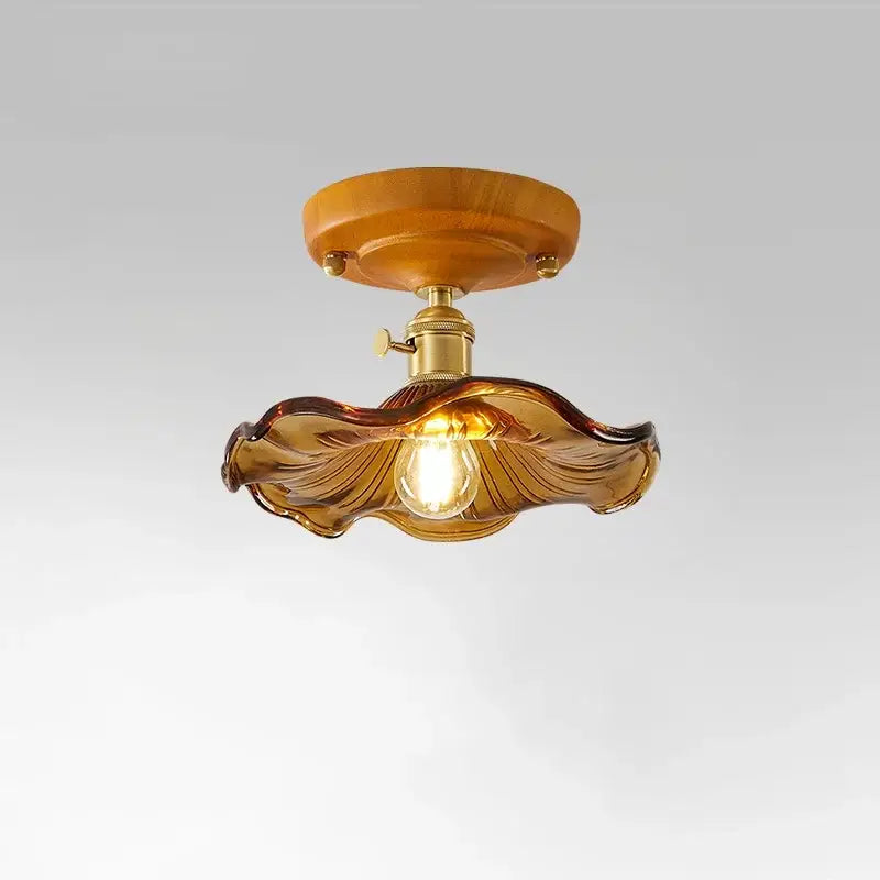 Amber leaf brass glass ceiling lamp with warm amber glass, wooden mount, and decorbites brass glass accents for bedroom decor