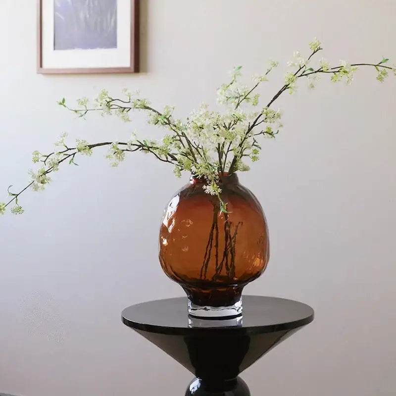 Amber colored decorbites gradient glass vase with rounded bulbous body and clear base for living room decor