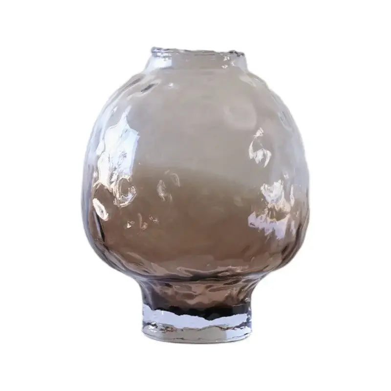 A textured translucent amber decorbites gradient glass vase with rounded body and flared rim for living room decor