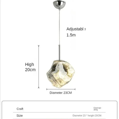 Amber textured ice glass pendant light with irregular shape and chrome finish hanging from adjustable chain for dining room decorbites ice glass