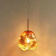 Amber textured ice glass pendant light with warm amber glass and copper-toned metal stem for dining room decorbites ice glass