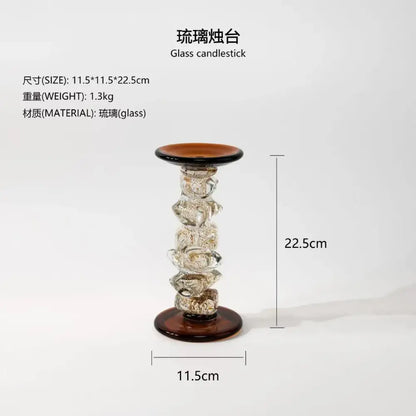 A tall amber twisted glass splicing candelabrum with dark amber base and top rim for dining room decor