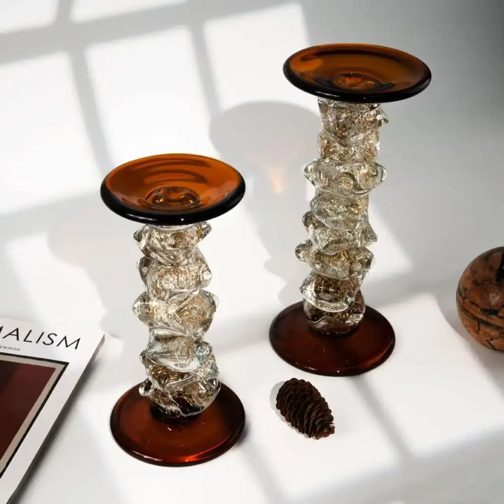 Amber glass splicing candelabrum with twisted stems and dark bases for elegant dining room decor