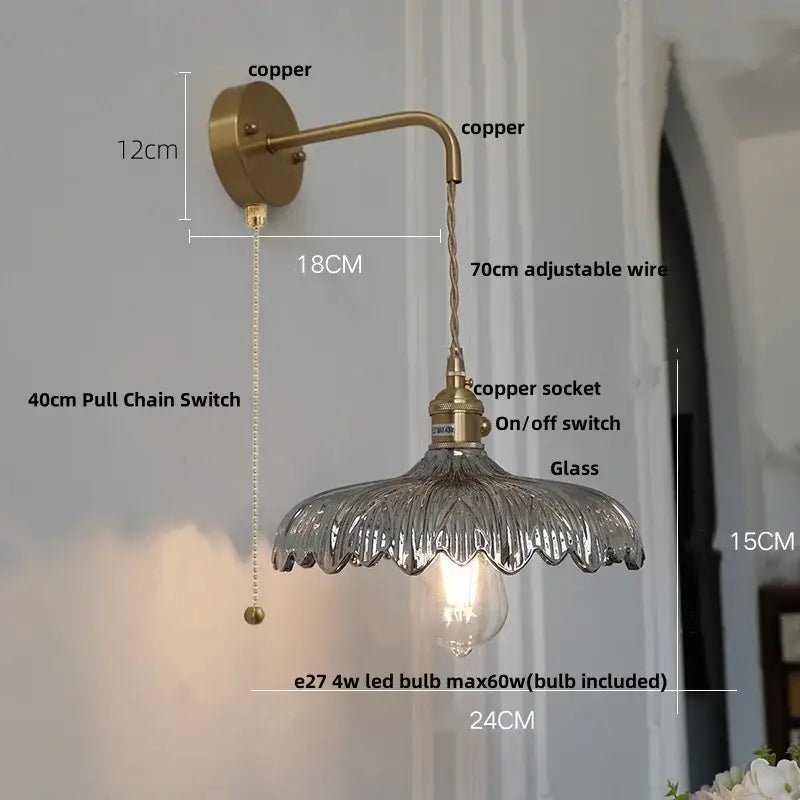 Antique brass-finished decorbites amber vintage wall light with scalloped glass shade and adjustable copper wire arm