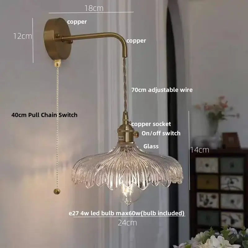 Antique brass-finished amber vintage led wall light with clear fluted glass shade and adjustable copper wire decorbites sconce