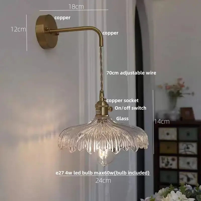 Antique brass-finished amber vintage led wall light with clear fluted glass shade and adjustable copper wire by decorbites