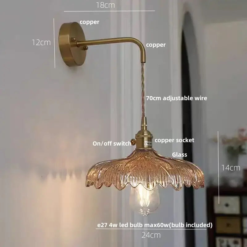 Antique brass-finished wall light with decorbites amber vintage led textured amber glass shade and adjustable copper wire