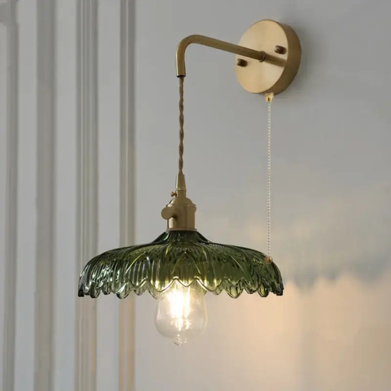 A decorbites amber vintage led wall light with brass arm and scalloped green glass shade for hallway decor