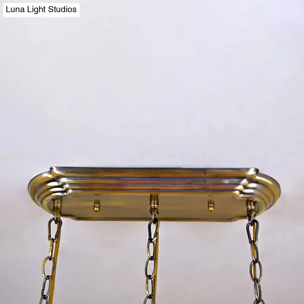 Brass-finished rectangular chandelier canopy with decorative ridged edges and three hanging chains for living room fixture width and height