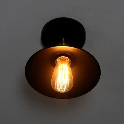 Black metal wall sconce with warm glowing edison bulb for decorbites american copper ceiling lamp lighting