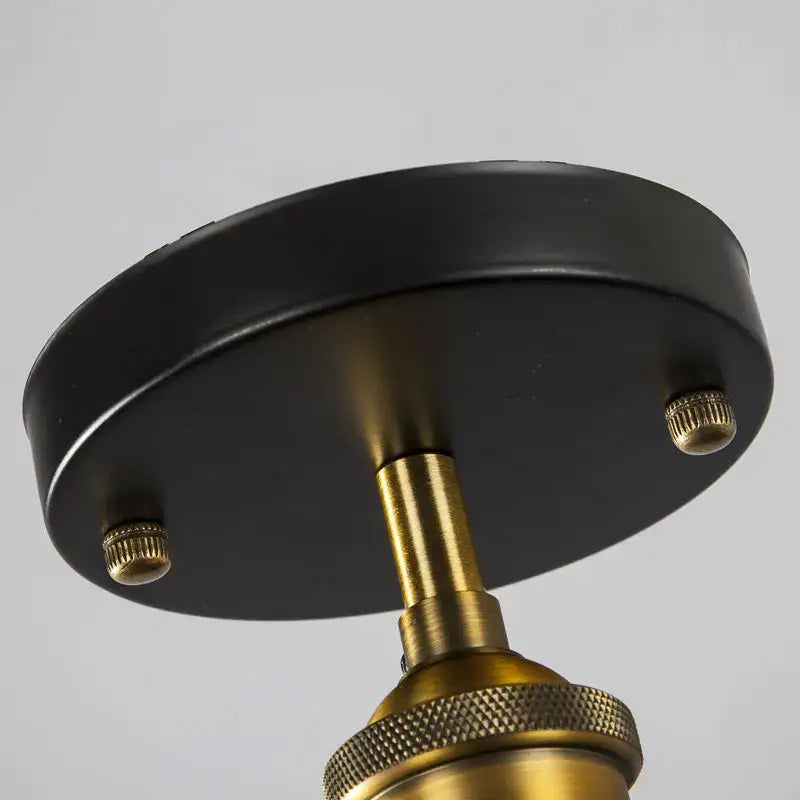 Black matte ceiling lamp with brass accents and textured knurled fittings from decorbites American copper ceiling collection