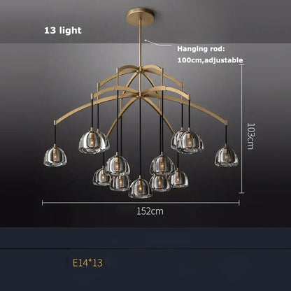 A modern brass decorbites american copper crystal chandelier with 13 clear glass bell-shaped shades and adjustable rod