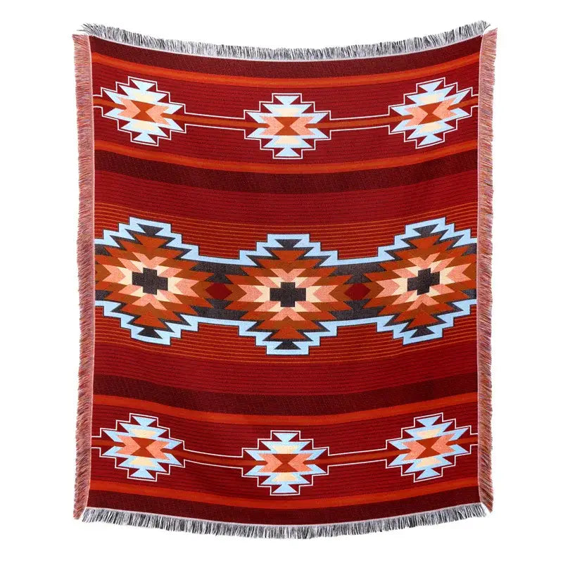 A richly patterned red woven blanket sofa cover with american country plaid tribal designs in cream black and light blue