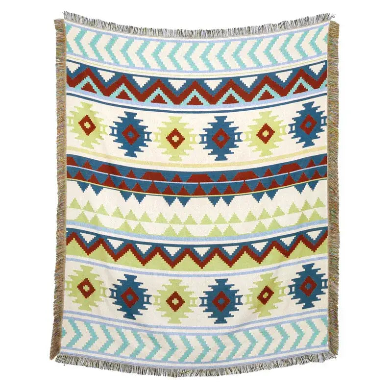 A woven american country plaid blanket sofa cover with blue red and green geometric tribal pattern and fringed edges