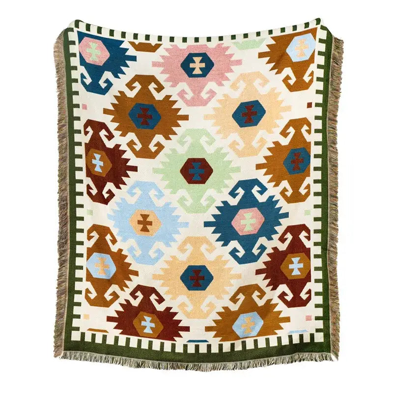 A cozy cream woven american country plaid blanket sofa cover with vibrant geometric pattern and fringed edges