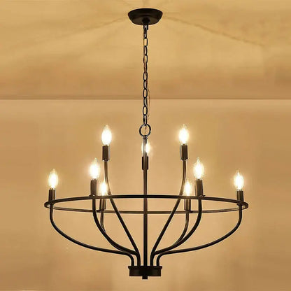 Black wrought iron art retro chandelier with six lit candle-style bulbs for american farmhouse dining room decorbites iron art
