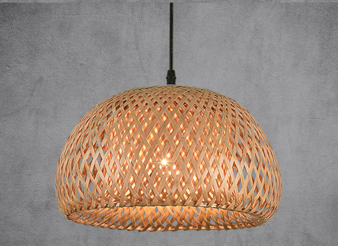 Rattan dome pendant light with woven texture and natural beige color.