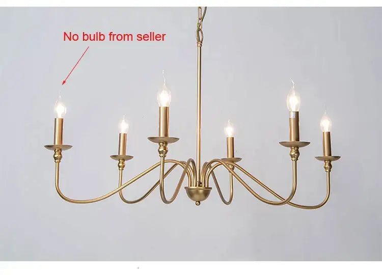 Gold-finished six-light american iron chandelier with black candle style bulbs and ornate curved arms for living room decorbites american iron