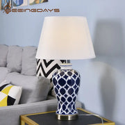American retro blue ceramic table lamp with blue and white pattern and cream fabric shade for bedroom decorbites blue ceramic