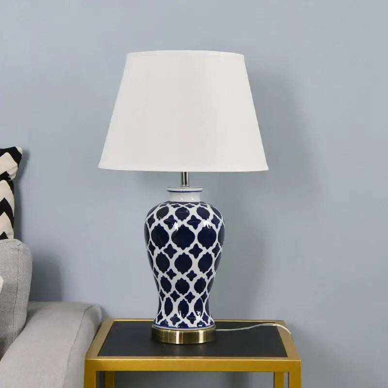 Blue ceramic table lamp with geometric pattern and gold-toned base for bedroom led light decorbites blue ceramic