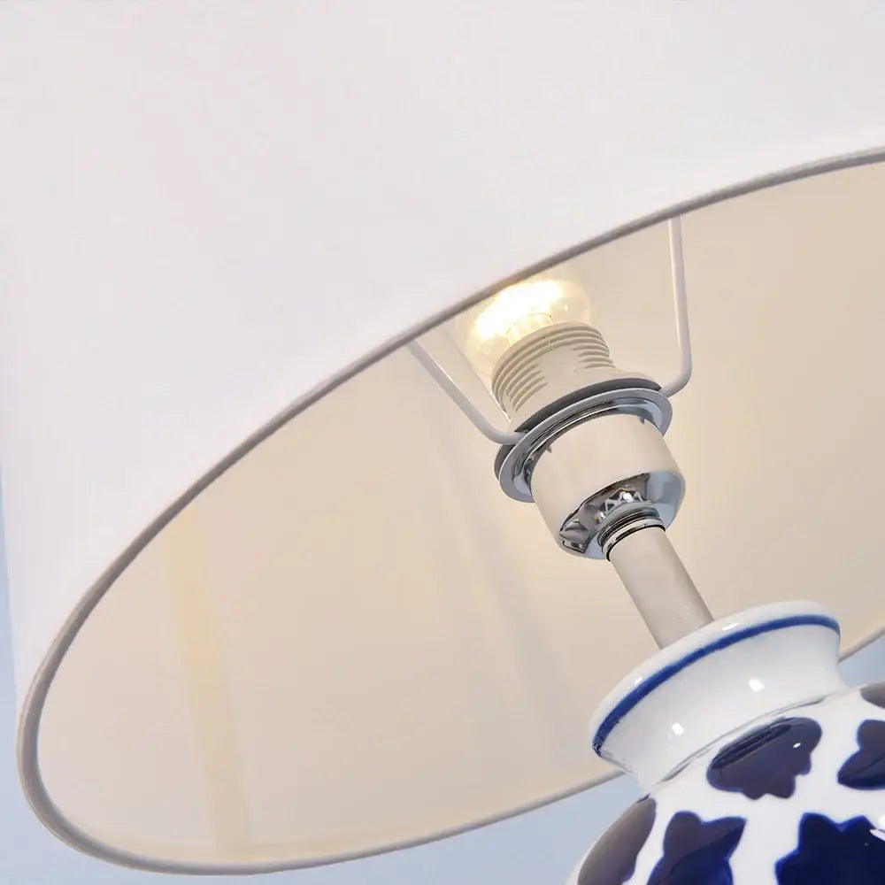 American retro blue ceramic table lamp with silver metal fixture and cream shade ideal for bedroom decorbites blue ceramic