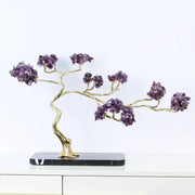 Amethyst and brass decorative sculpture with golden metal branches and purple crystals on black marble base decorbites crystal