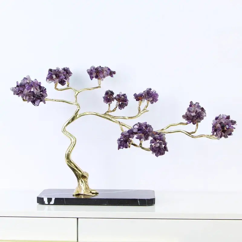 Amethyst and brass decorative sculpture with golden metal branches and purple crystals on black marble base decorbites crystal