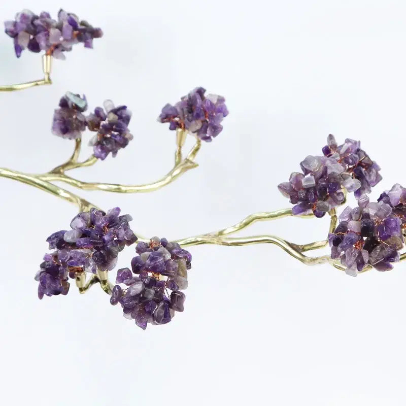 Amethyst and brass decorative sculpture featuring faceted purple stones on a gold wire frame decorbites crystal tree