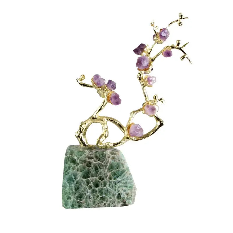 A delicate gold-toned brass tree ornament featuring faceted purple amethyst blossoms on a green aventurine base