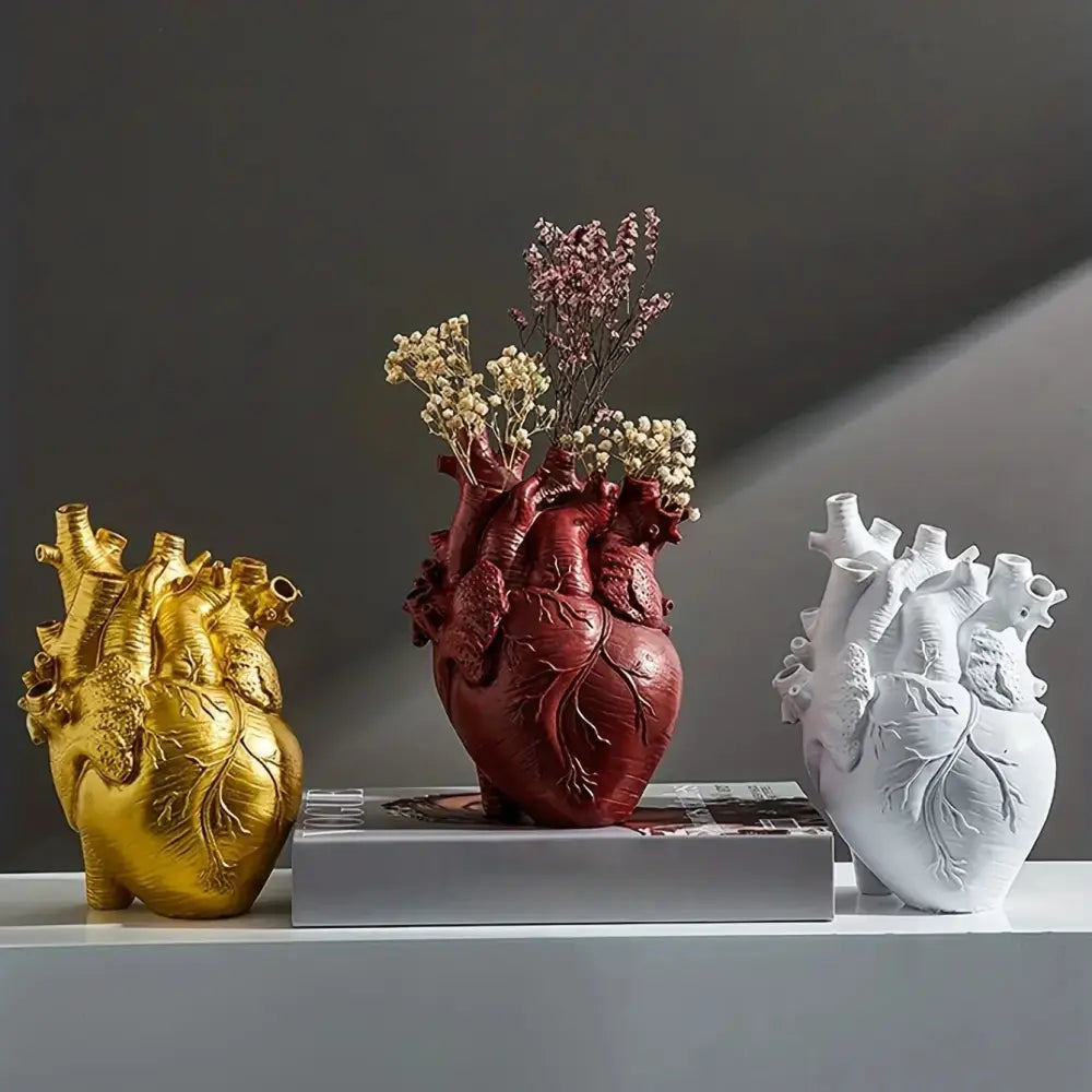 Three anatomical heart resin vases in gold deep red and white by decorbites™ for glam decor interior use