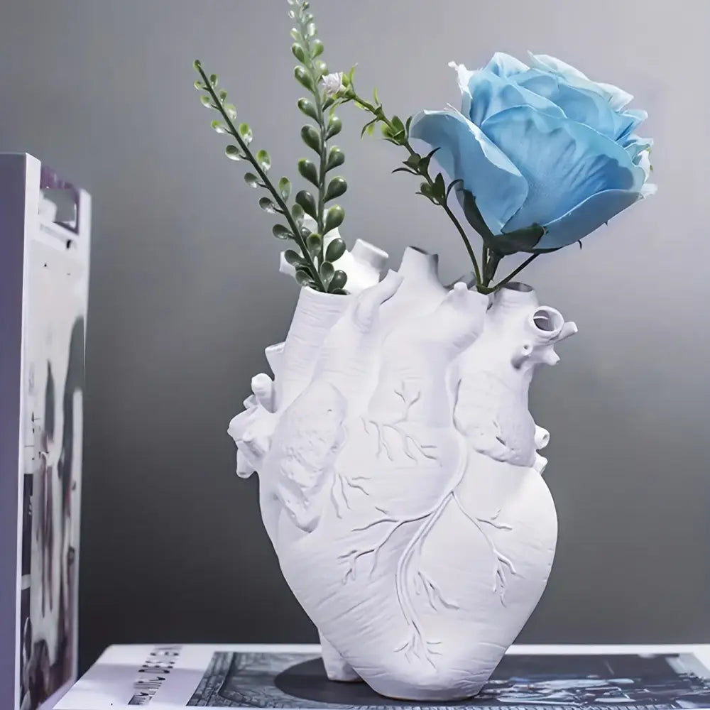 White ceramic anatomical heart vase with detailed ridges and chambers from decorbites resin glam decor collection
