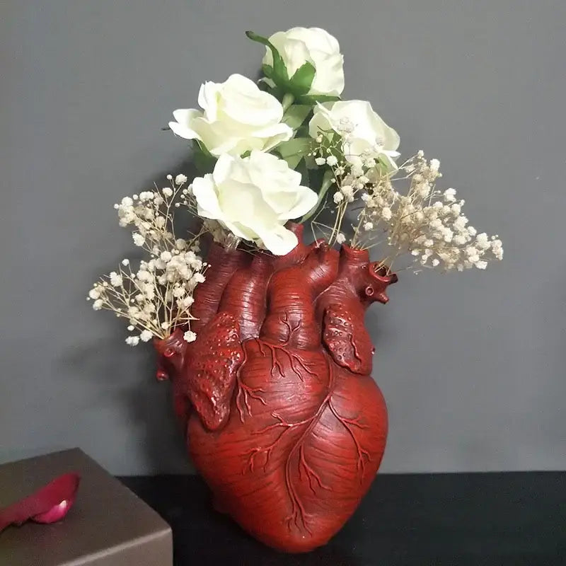 Red anatomy heart vase holding white roses and baby’s breath by DecorBites™ perfect heart vase gift