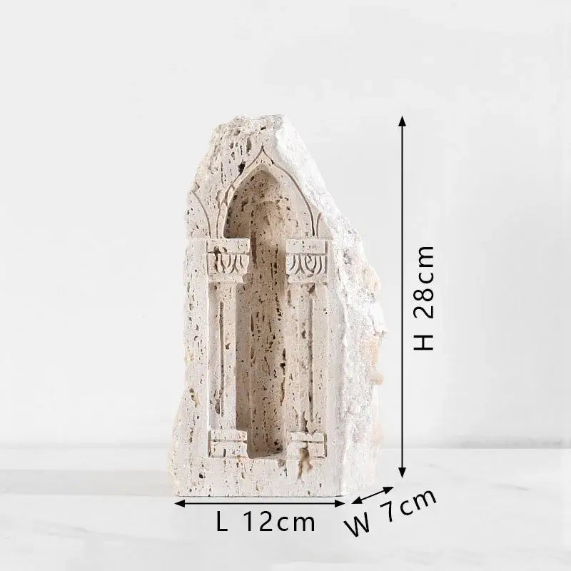 A textured off-white stone ancient greek roman temple bookend with intricate gothic arch carvings for home decor