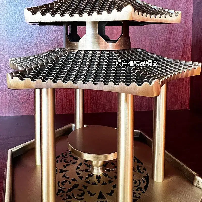 Ancient pavilion brass incense burner with multi-tiered pagoda design and intricate wave-patterned roof tiles for decor