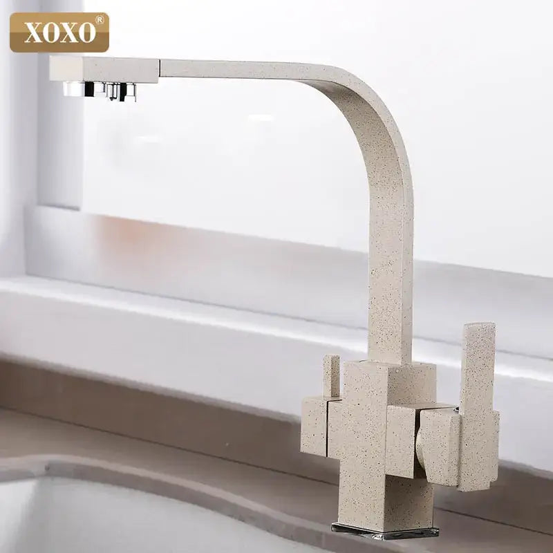 Beige speckled stone-effect decorbites black single single hole kitchen faucet with modern curved spout and geometric base design