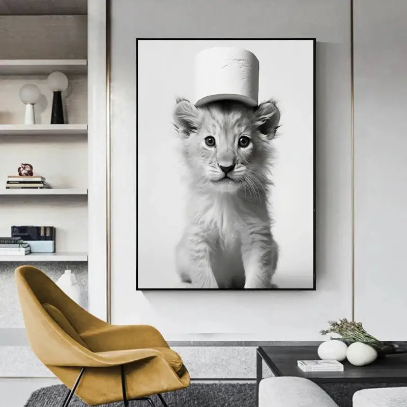 Black-framed black-and-white cute animal canvas featuring a lion cub with a toilet paper roll hat for bathroom wall art