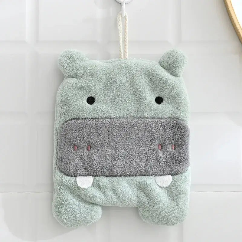 Soft mint-green plush hippo hand towel with gray snout made of microfiber for bathroom decorbites elephant hippo use