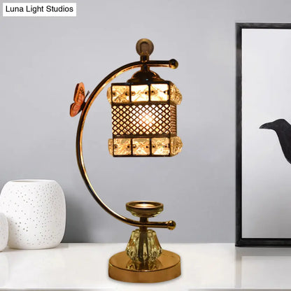 Anna - Lámpara de mesa moderna con forma de cubo/flor, estilo modernista, con incrustaciones de cristal, una cabeza, color dorado, con brazo curvo.