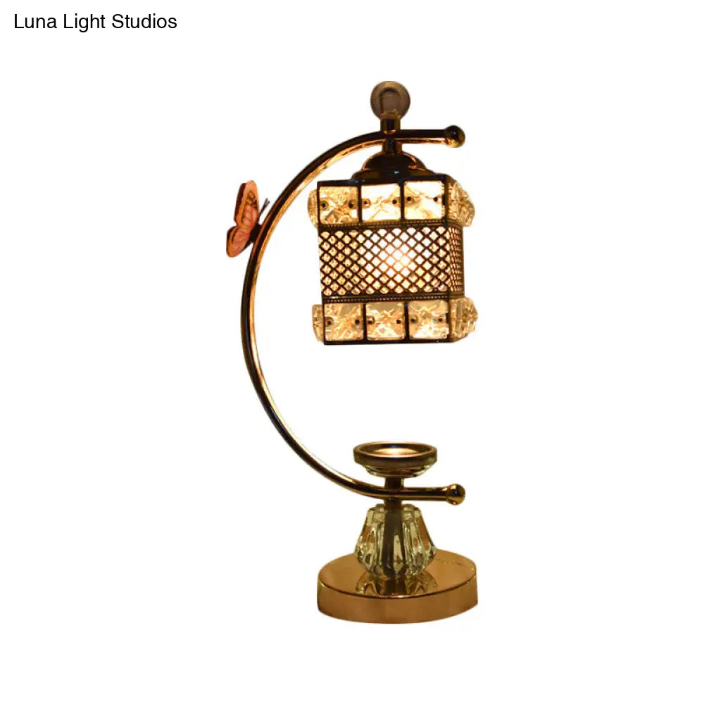 Anna - Lámpara de mesa moderna con forma de cubo/flor, estilo modernista, con incrustaciones de cristal, una cabeza, color dorado, con brazo curvo.