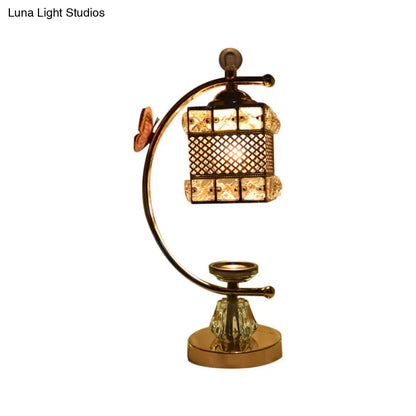 Anna - Lámpara de mesa moderna con forma de cubo/flor, estilo modernista, con incrustaciones de cristal, una cabeza, color dorado, con brazo curvo.