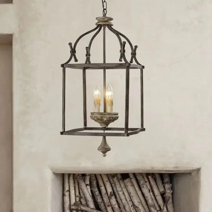 Antique american iron e14 chandelier lantern light with distressed dark bronze finish and glowing candle bulbs for dining room decorbites american iron