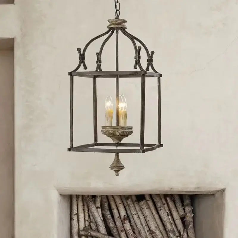 Antique american iron e14 chandelier lantern light with distressed dark bronze finish and glowing candle bulbs for dining room decorbites american iron