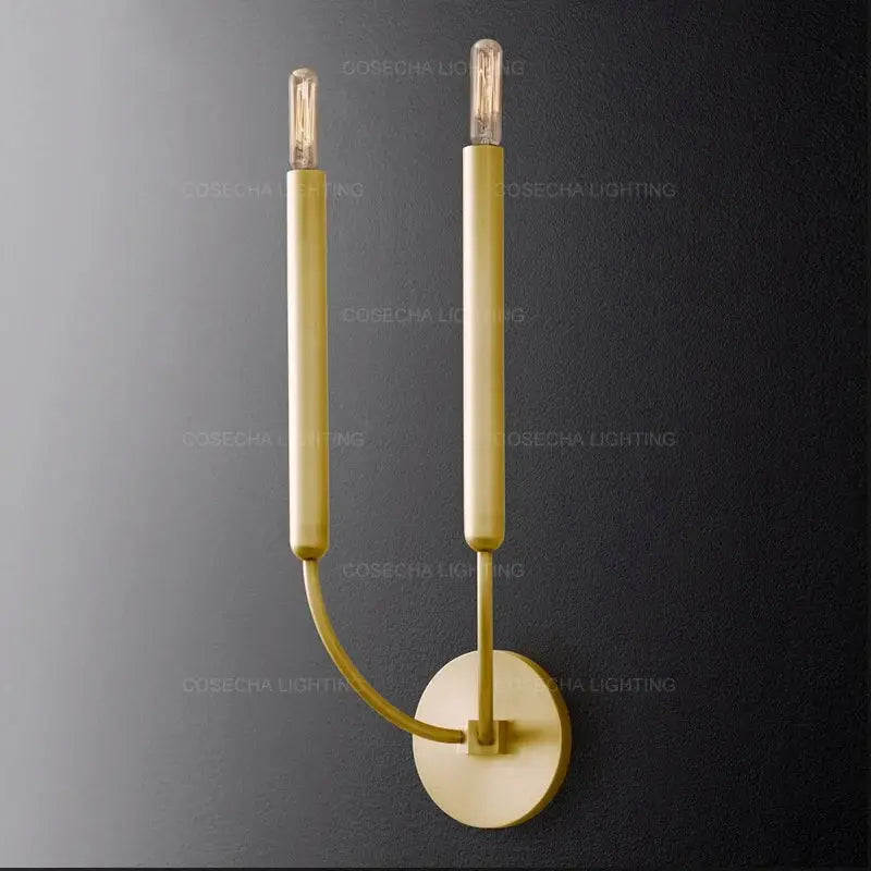 Gold-toned antique art deco wall lamps with two candle-style arms and exposed bulbs for living room mirror lights