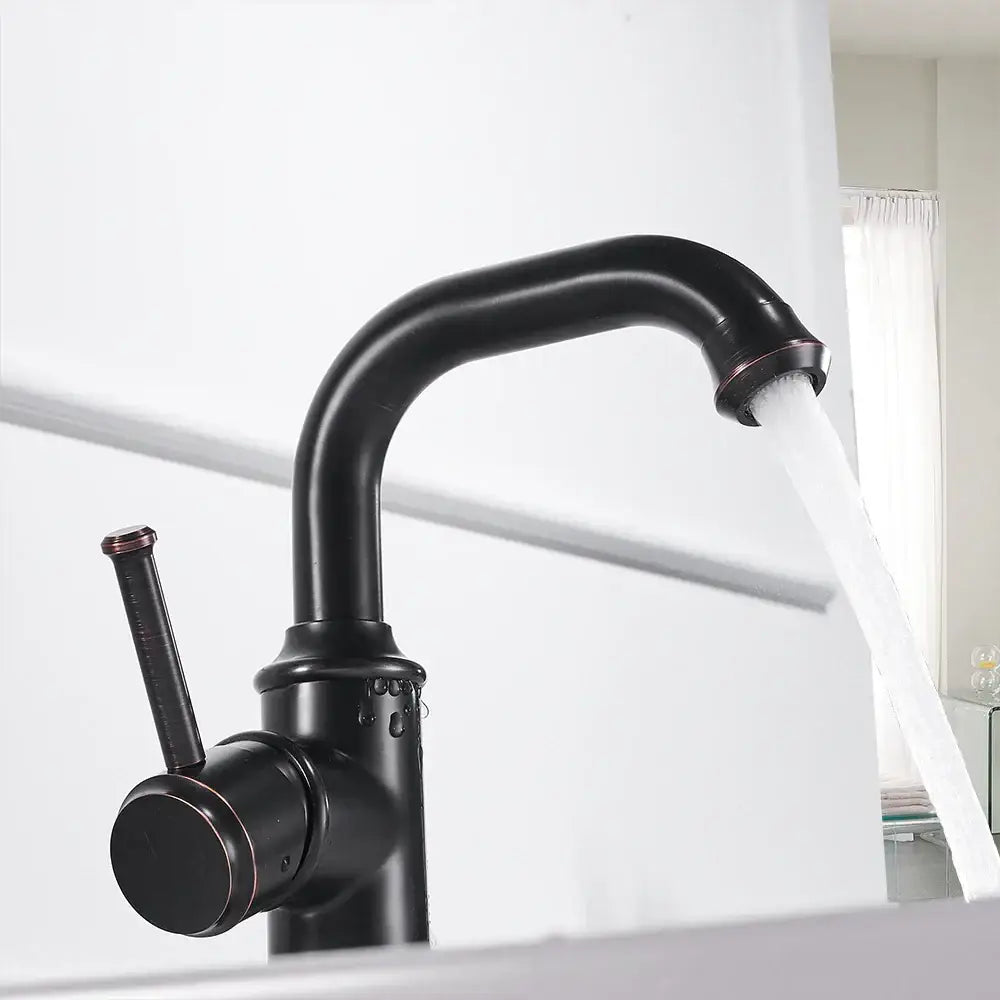 Antique black brass bathroom faucet with black matte finish curved spout and single lever handle for cold water by decorbites black brass