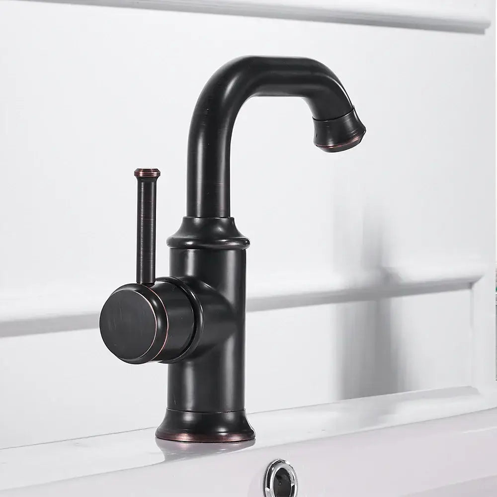 Antique black brass single-handle bathroom faucet with black matte finish cold water mixer and copper-toned accents decorbites black brass