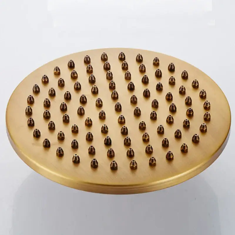 Gold-colored round showerhead with matte finish and multiple nozzles for decorbites black antique bathroom rain shower system