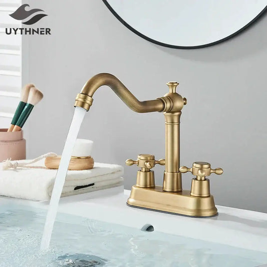 Antique black brass waterfall basin faucet with antique brass finish curved spout and two cross-handle knobs decorbites black brass