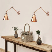 Copper-finished antique adjustable wall lamp sconce with conical shades for bedroom lighting