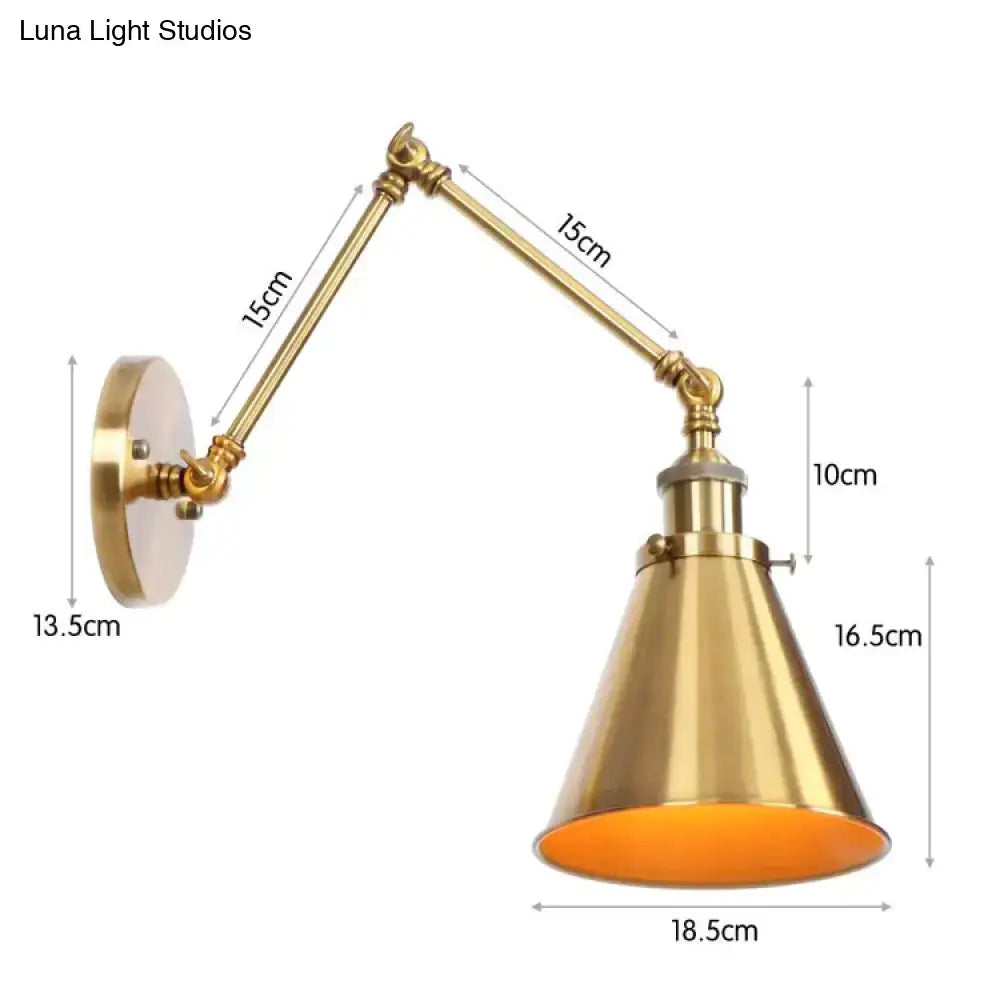 Antique adjustable wall lamp sconce in brass finish with conical shade and orange interior for bedroom lighting